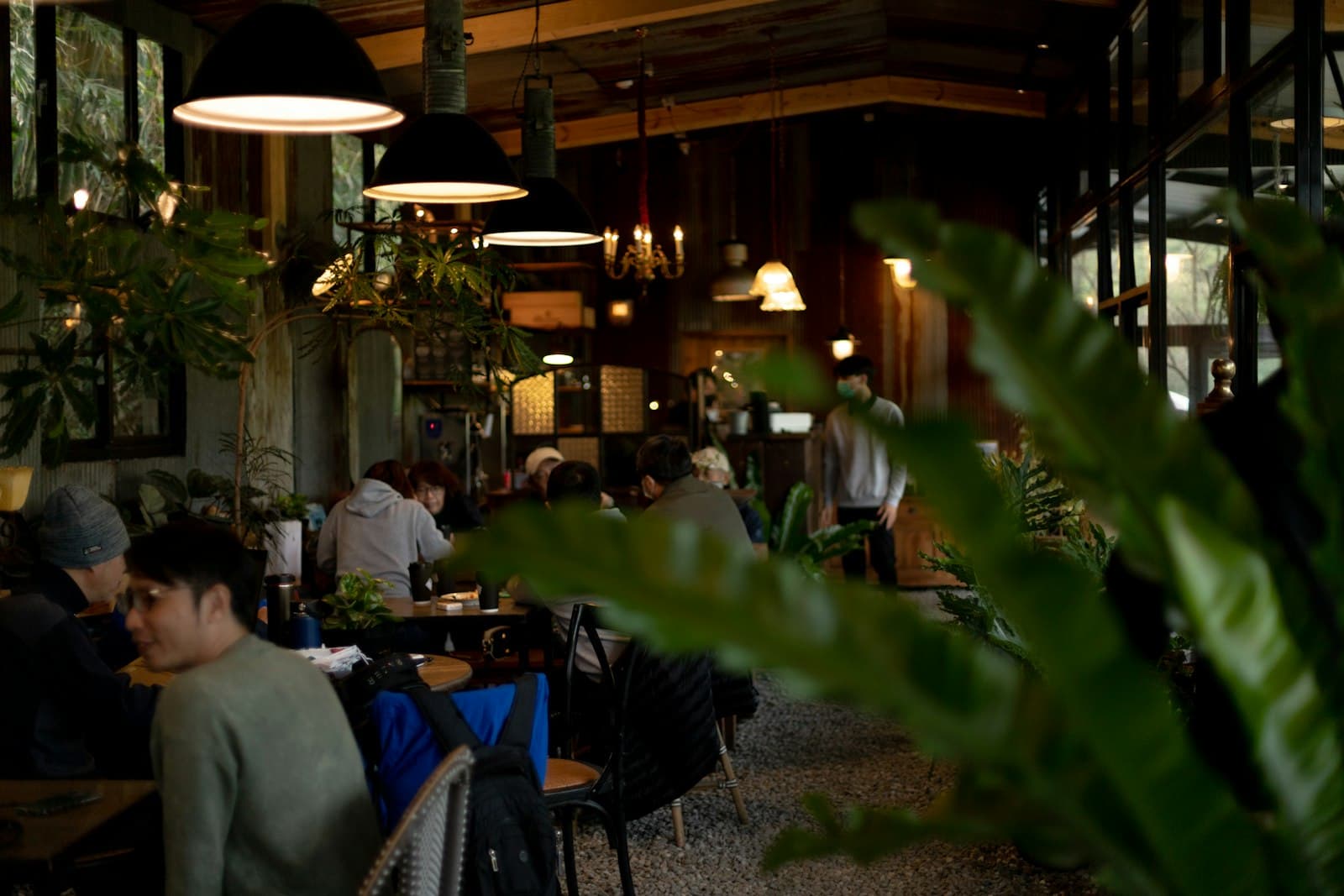 West Village Café interior with warm lighting and community atmosphere